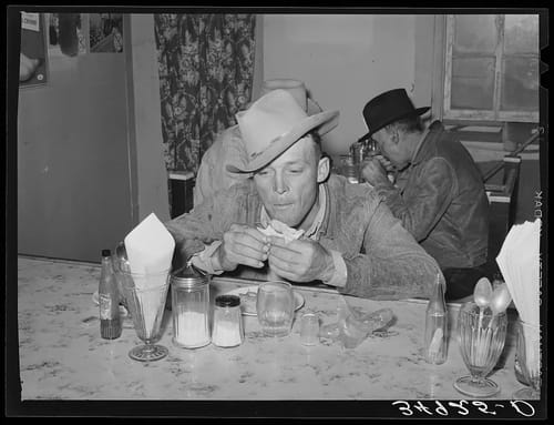 Can You Feel the Soul of West Texas in This 1939 San Angelo Stockyards Photo? 🤠🥩
